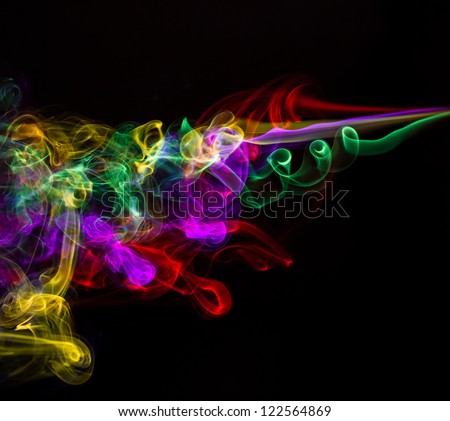 Abstract smoke. colored smoke on a black background