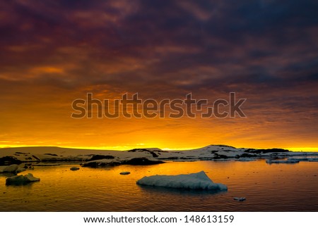 Summer  sunset in Antarctica.  Beautiful winter background.