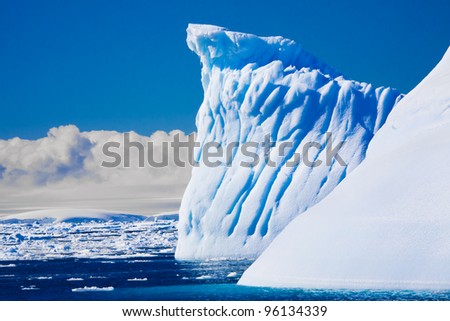 Beautifull big antarctic iceberg in the snow
