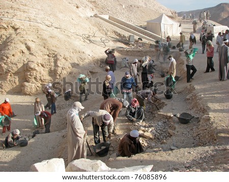 LUXOR, EGYPT - JAN 9:  Workers sift through dirt and debris at an archaeological site at the Valley of the Kings on January 9, 2009 on the West Bank of the Nile, Luxor, Egypt.