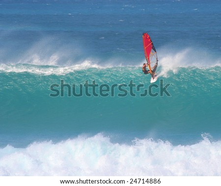 MAUI - JANUARY 17: Windsurfer slides right in big wave contest at Ho\'okipa on Maui\'s northshore on January 17, 2009.