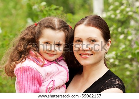 Mother and the daughter on nature