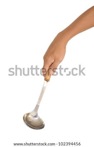 isolated hand holding a ladle or soup scoop for soup, for cooking or dining concepts. Clipping path of outline is in jpg.