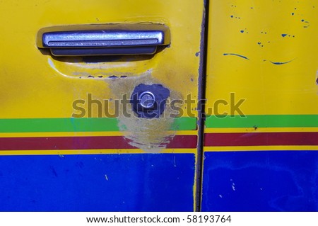 car door handle and keyhole, with color paint