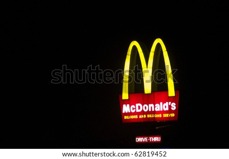 MANILA PHILIPPINES CIRCA 2010 a big mcdonalds sign board with a tag 'billions and billions served circa 2010 in Manila Philippines Philippines is another fastfood nation MANILA PHILIPPINES CIRCA 2010 a big mcdonalds sign board with a tag 'billions and billions served circa 2010 in Manila Philippines Philippines is another fastfood nation