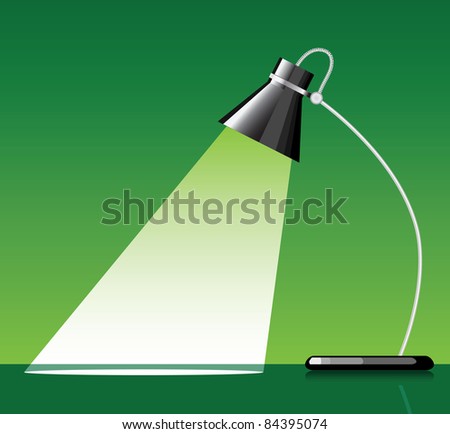 desk lamp with a green background, with a empty space under spotlight.