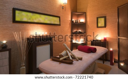 Nice massage room in spa saloon decorated with candles.