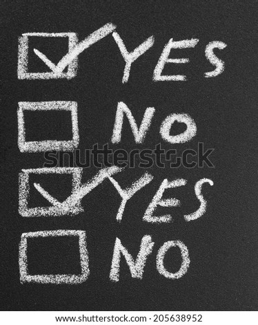 Yes no check box by chalk in black slate