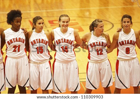 FREDERICTON, CANADA - AUGUST 11: Team Ontario players in the Canadian 17U women\'s basketball championship game August 11, 2012 in Fredericton, Canada. Ontario defeated Nova Scotia 66-48.