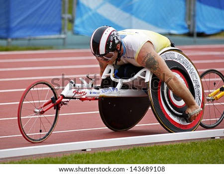 MONCTON, CANADA - June 22: 10,000-meter run wheelchair athlete Joshua Cassidy races at the Canadian Track & Field Championships June 22, 2013 in Moncton, Canada.