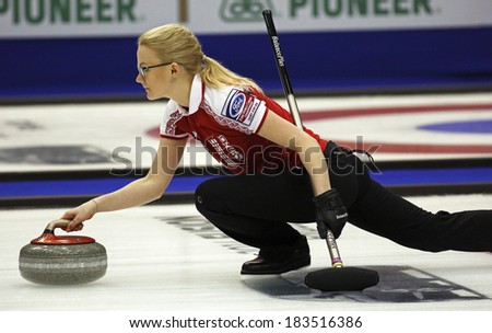 SAINT JOHN, CANADA - March 19: Russia\'s Alexandra Saitova delivers a stone at the Ford World Women\'s Curling Championship March 19, 2014 in Saint John, Canada.