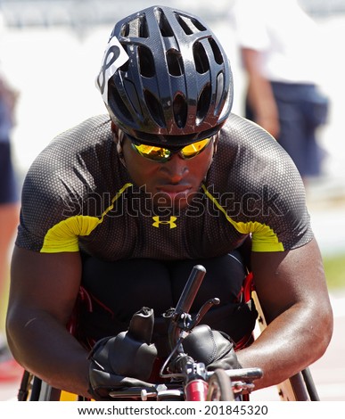 MONCTON, CANADA - June 28: Isaiah Christophe competes in the men\'s 200-meter wheelchair race at the Canadian Track & Field Championships June 28, 2014 in Moncton, Canada.