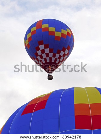SUSSEX, CANADA - SEPTEMBER 12: Two hot air balloons launch at the 2010 Atlantic International Balloon Fiesta on September 12, 2010 in Sussex, Canada.