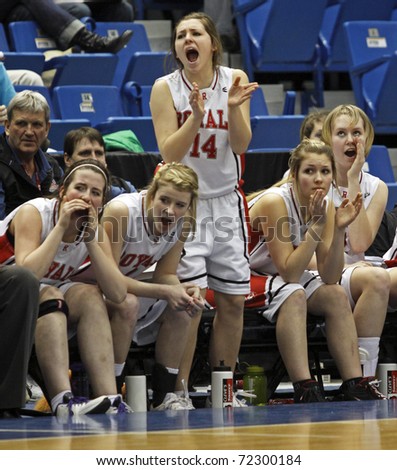 SAINT JOHN, CANADA - FEBRUARY 26: The Riverview Royals react to a score at the NB high school senior girls AAA basketball final February 26, 2011 in Saint John, Canada. Riverview beat Woodstock 71-48.