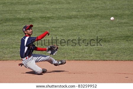 BANGOR, MAINE - AUGUST 18: Shortstop Melvin Rosita of Asia-Pacific (Tanauan City, Philippines) flips to second base at the Senior League Baseball World Series August 18, 2011 in Bangor, Maine.