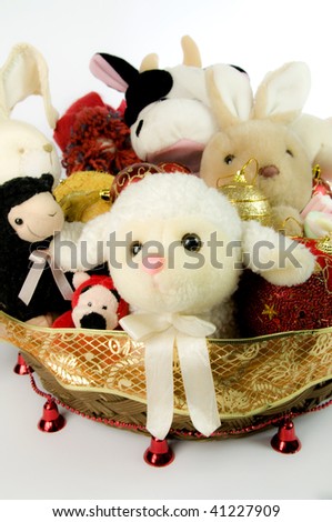 Toys stuffed into Christmas baskets