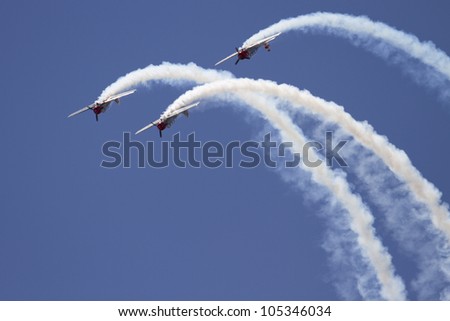 ROCKFORD, IL - JUNE 3: Airplane formation from the Aerostars team demonstrates flying skills and aerobatics at the annual Rockford Airfest on June 3, 2012 in Rockford, IL