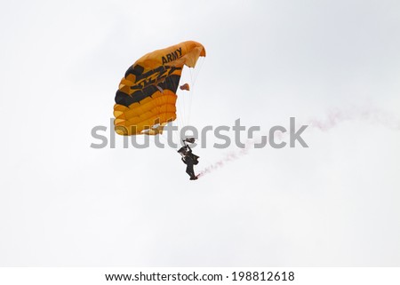 ROCKFORD, IL - JUNE 7: U.S. Army Golden Knights Parachute Team demonstrates flying skills at the annual Rockford Airfest on June 7, 2014 in Rockford, IL