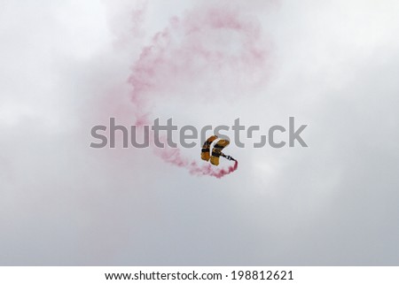 ROCKFORD, IL - JUNE 7: U.S. Army Golden Knights Parachute Team demonstrates flying skills at the annual Rockford Airfest on June 7, 2014 in Rockford, IL