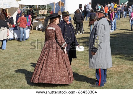 CHANNAHON, IL - OCTOBER 17: 19-th century dressed people at the Civil War Days Reenactment annual event on October 17, 2010 in Channahon, IL