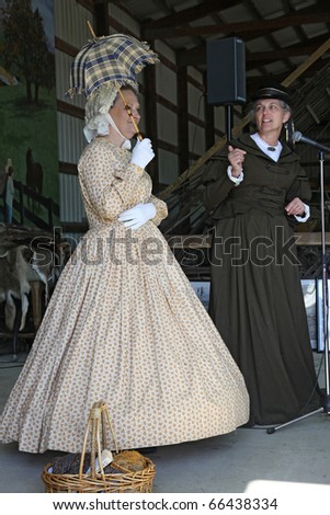 CHANNAHON, IL - OCTOBER 17: 19-th century dressed models at the fashion show in the Civil War Days Reenactment annual event on October 17, 2010 in Channahon, IL