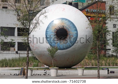 CHICAGO, ILLINOIS - AUGUST 29: The giant eyeball sculpture designed by Tony Tasset on display in the summer of 2010 as seen on August 29, 2010 in Chicago, IL