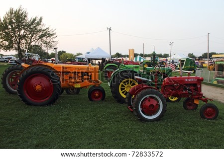 WOODSTOCK, IL - AUGUST 05: Vintage tractors at the Farmers fair and machinery exhibition on August 5, 2010 in Woodstock, IL