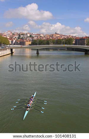 LYON, FRANCE - MAY 1 : Crossing of Lyon brings together more than 200 rowers along the Saone river, on a race of 35 km. May 1, 2012 in Lyon, France. The race is organized by Aviron Nautique de Lyon