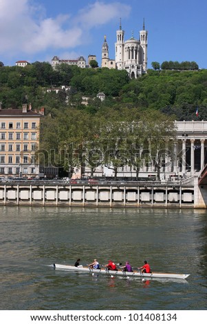 LYON, FRANCE - MAY 1 : Crossing of Lyon brings together more than 200 rowers along the Saone river, on a race of 35 km. May 1, 2012 in Lyon, France. The race is organized by Aviron Nautique de Lyon