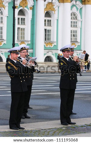 ST-PETERSBURG, RUSSIA - AUGUST 25: Russian Army musicians commemorate 200th anniversary of 1812 Russian victory over French army on Hermitage Palace Place on August 25, 2012 in St-Petersburg, Russia