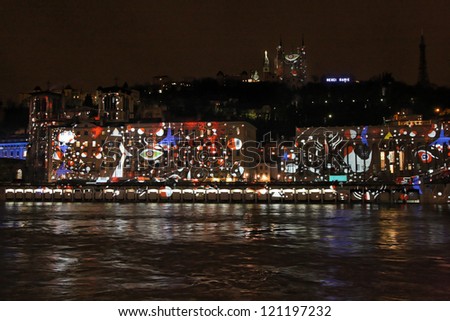 LYON, FRANCE - DECEMBER 7 : Festival of Lights in the city streets on December 7, 2012 in Lyon, France. Festival of Lights expresses gratitude toward Mary, mother of Jesus around December 8 each year
