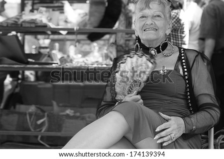 BUENOS AIRES, ARGENTINA, JANUARY 5, 2014 : Old Tango Dancer in San Telmo. In 2009, UNESCO approved a proposal to include the tango in the UNESCO Intangible Cultural Heritage Lists