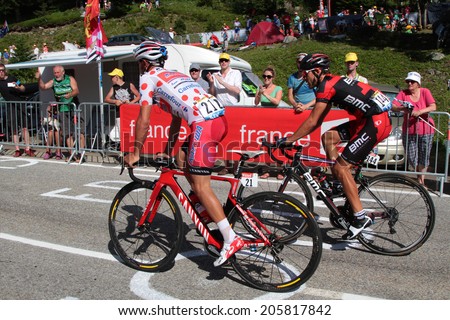 CHAMROUSSE, FRANCE, JULY 18, 2014 : Joaquim Rodriguez, polka-dot jersey of best climber, and Amael Moinard during Chamrousse stage. Tour de France is the biggest cycling race in the world.