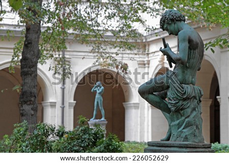 LYON, FRANCE, OCTOBER 25, 2014 : Statues in the park of Palais Saint-Pierre. This Palace houses Museum of Fine Arts of Lyon and is a former Benedictine convent of the 17th century.