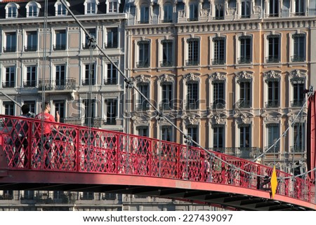 LYON, FRANCE, NOVEMBER 1, 2014 : Footbridge over Saone river in Lyon city center. Lyon forms the 2nd-largest metropolitan area in France with a population of more than two millions.
