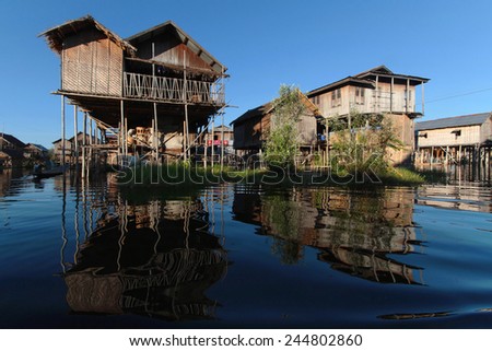 INLE LAKE, MYANMAR, December 14, 2014 : Houses on the Lake. People built on the water its houses on piles and lives on culture of fruits, vegetables and flowers on incredible floating islands