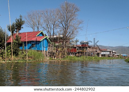 INLE LAKE, MYANMAR, December 14, 2014 : New house on the Lake. People built on the water its houses on piles and lives on culture of fruits, vegetables and flowers on incredible floating islands
