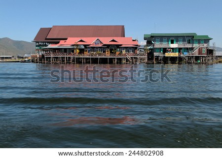 INLE LAKE, MYANMAR, December 14, 2014 : Stores on the Lake. People built on the water its houses on piles and lives on culture of fruits, vegetables and flowers on incredible floating islands