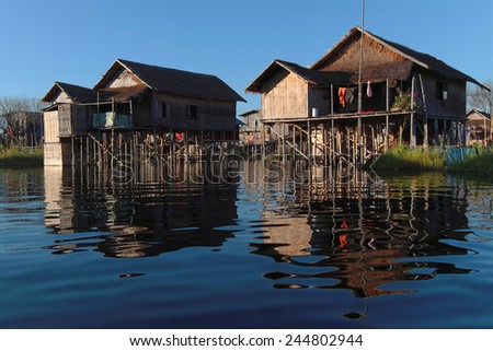 INLE LAKE, MYANMAR, December 14, 2014 : Houses on the Lake. People built on the water its houses on piles and lives on culture of fruits, vegetables and flowers on incredible floating islands