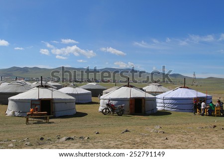 KHARKHORIN, MONGOLIA, July 9, 2013 : A village of yurts is raised in the steppe for Naadam festival. Naadam is inscribed on the Representative List of the Intangible Cultural Heritage of Humanity.