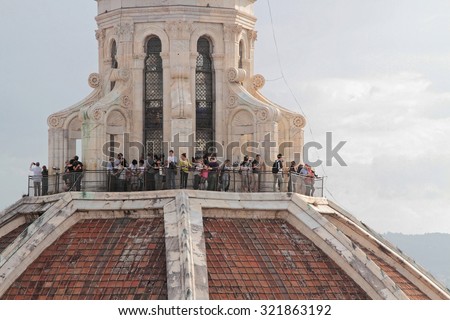 FLORENCE, ITALY, September 14, 2015 : Tourists on the top of Florence Cathedral. Florence is considered the birthplace of the Renaissance and attracts the tourists of the whole world.