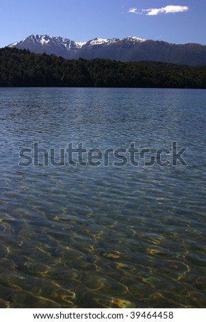 Te Anau lake calm waters in the morning light