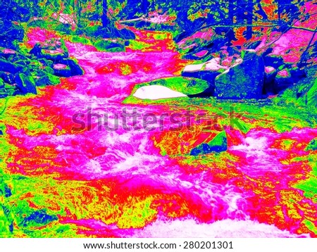 Foamy water level of waterfall, curves between boulders of rapids. Cold water of mountain river in infrared photo. Amazing thermography.