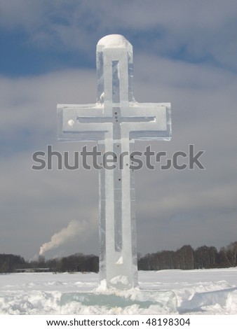 Ice holy cross on the lake in winter