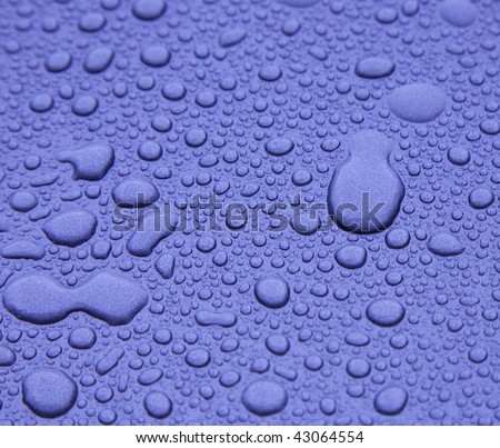 Raindrops on metallic surface