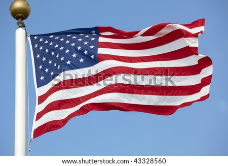 pictures of american flag waving. stock photo : Photo of American flag waving in the wind