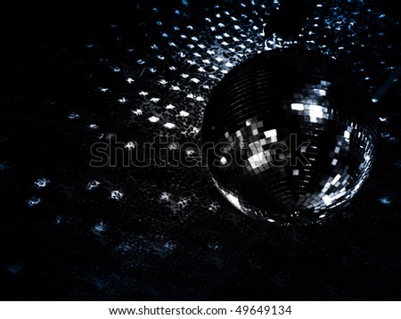 Mirror ball reflections on a ceiling of a night club. Focus on reflections.