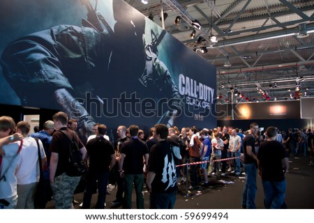COLOGNE - AUGUST 21: Videogamers getting in line to play Call of Duty: Back Ops at GamesCom 2010, the most important European video games Expo August 21, 2010 in Cologne, DE