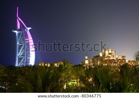 DUBAI - MAY 12: Burj al Arab hotel, one of the few 7 stars hotel in the world and one of the most recognized luxury symbol as seen from the Madinat Jumeirah Resort at night on May 12, 2011 in Dubai
