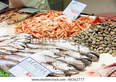 Fresh prawns, tuna and cods sold in traditional market in Granada, Spain